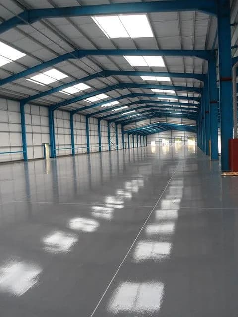 Heavy-duty resin floor spanning an industrial plant